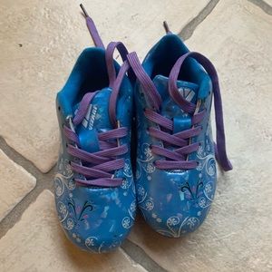 Little girls frozen soccer cleats
